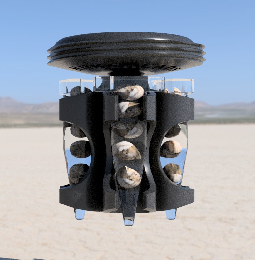 A mechanical device with rotating parts set against a desert landscape.